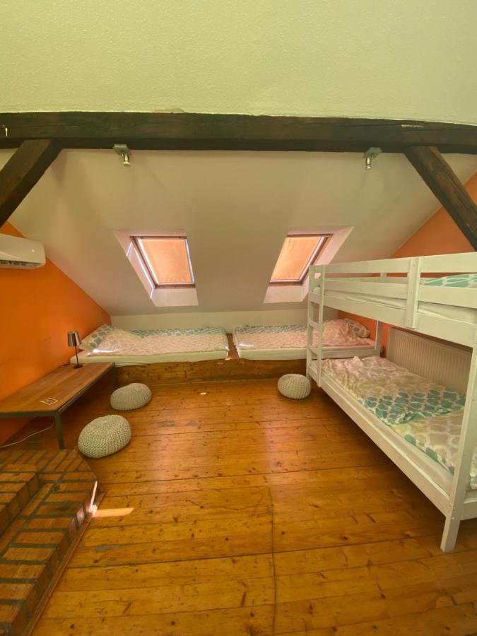 Camera Familiare con Bagno in Comune