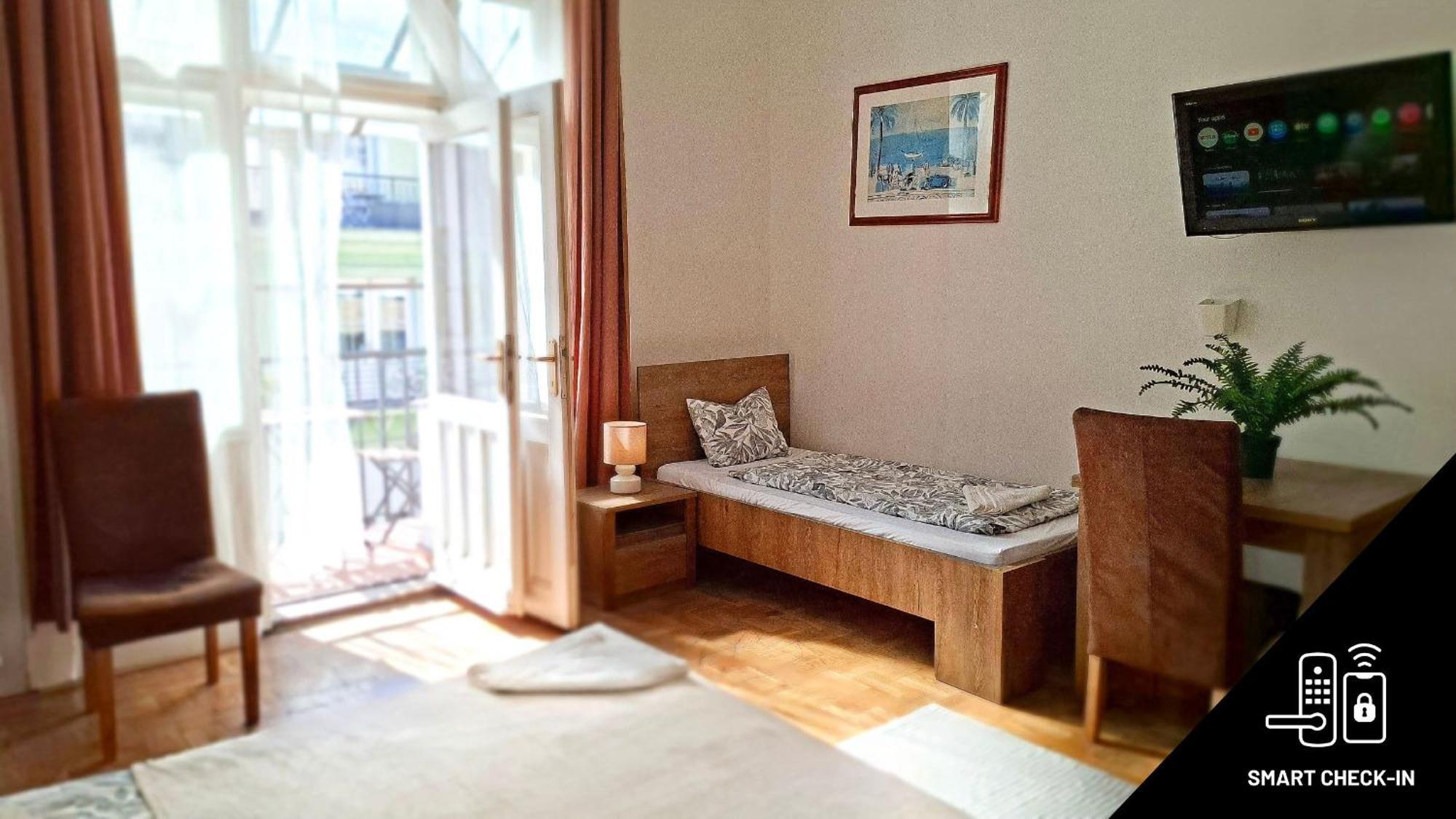 Large Family Room Balcony Share Bathroom